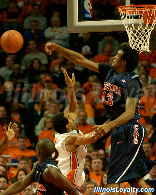 Jordan Hill blocks Brian Randle.